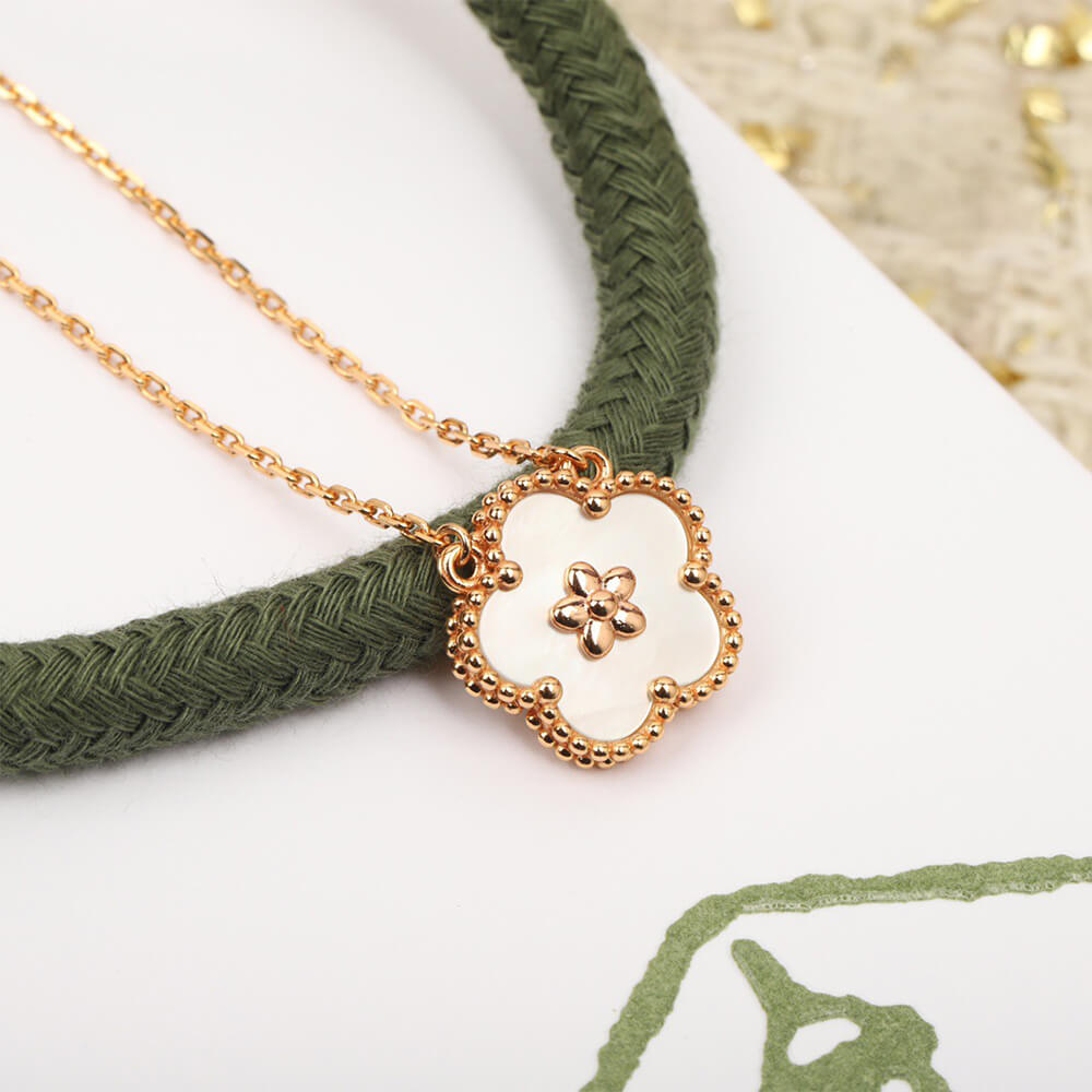 V*n Cl**f & Arpels Lucky Spring pendant, plum blossom