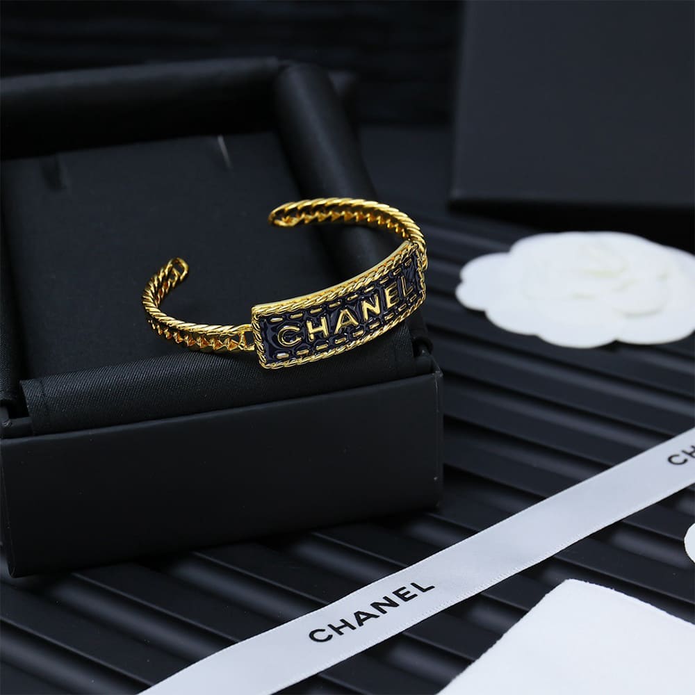 Ch**el Wide Gold Metal Bracelet