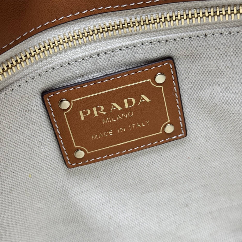 Pra*a Aimée large crochet and leather bag