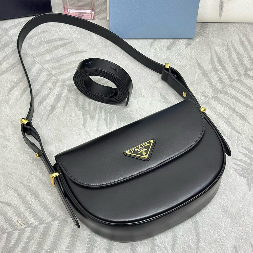 Pra*a Arque leather shoulder bag with flap