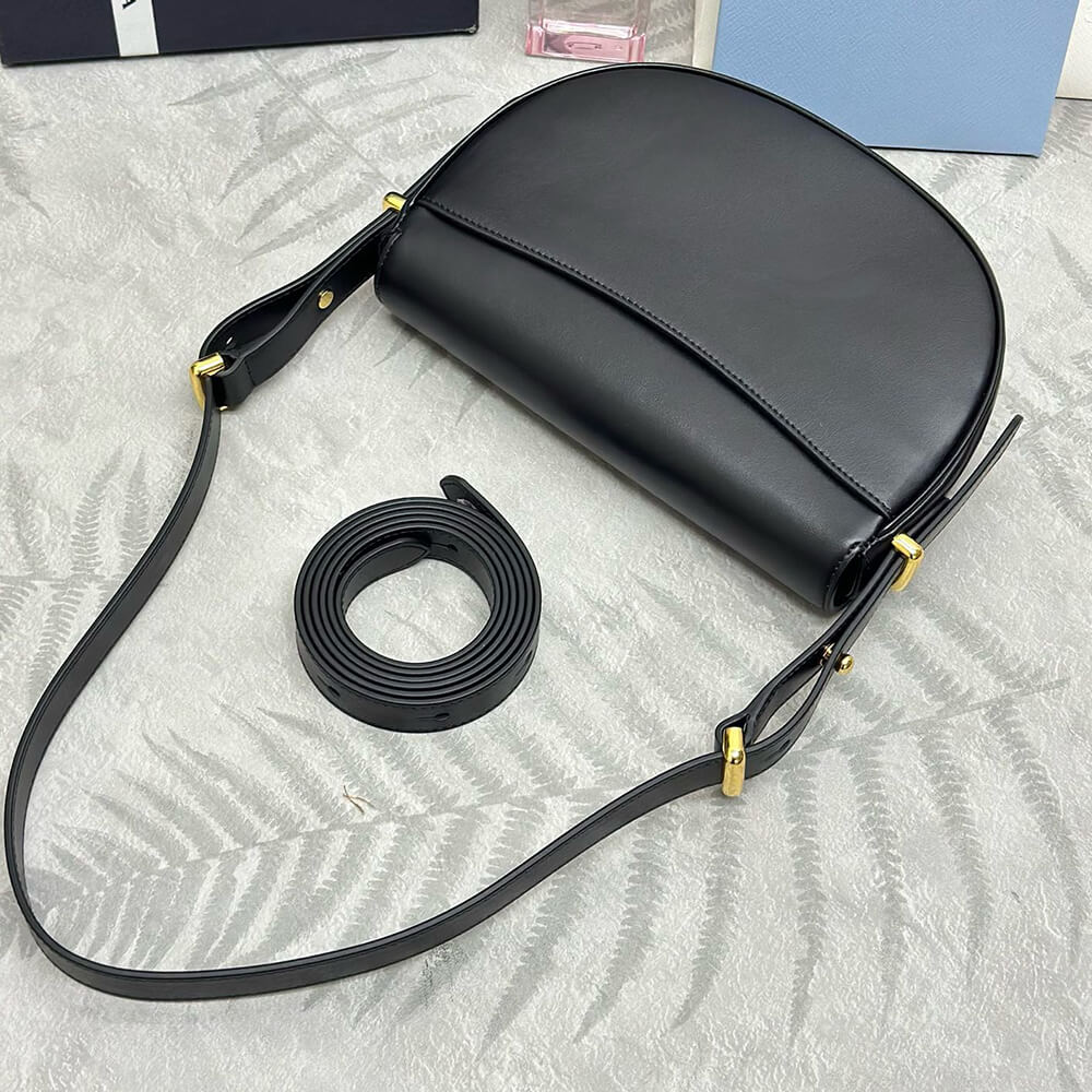 Pra*a Arque leather shoulder bag with flap