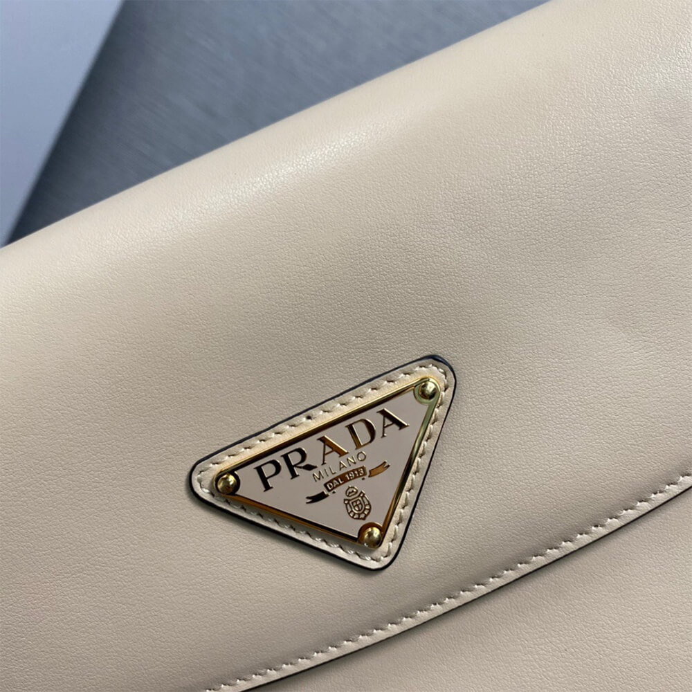 Pra*a Arque leather shoulder bag with flap