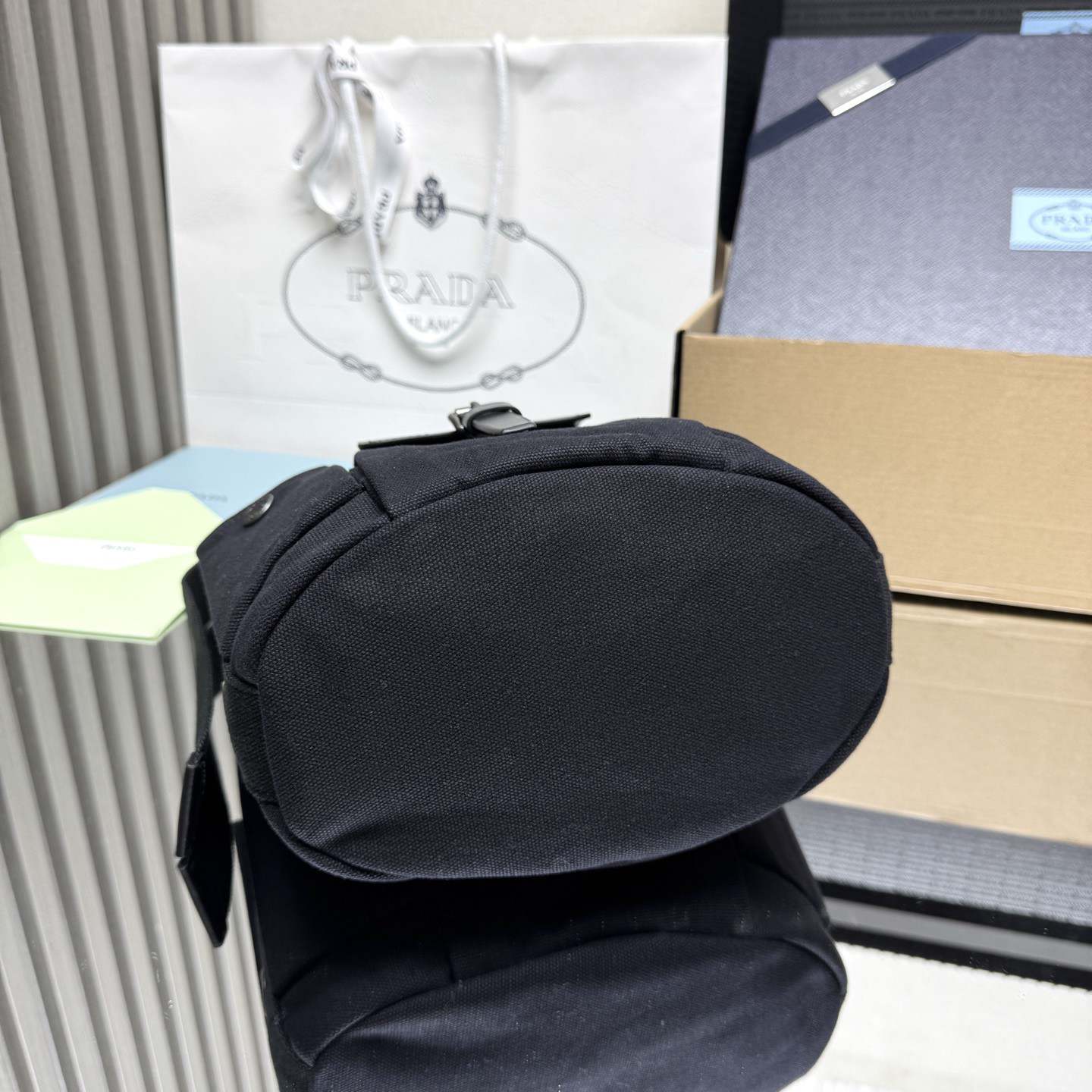Pra*a Route mini canvas and leather bucket bag(HIGH-END GRADE)